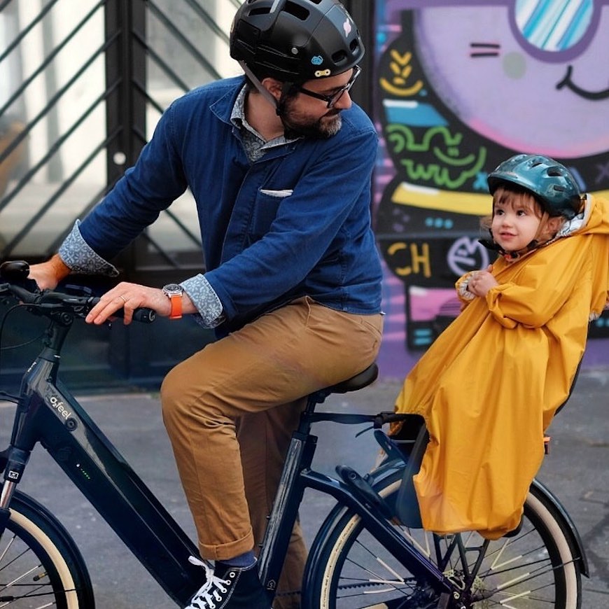 regenjas rainnette fietsstoel regen mobiliteit 
