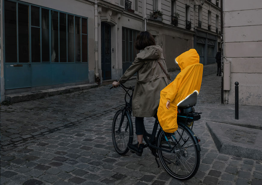 rainette fietsaccessoires fietskledij regenkledij kinderen fiets fluo reclecterend zichtbaar op de fiets